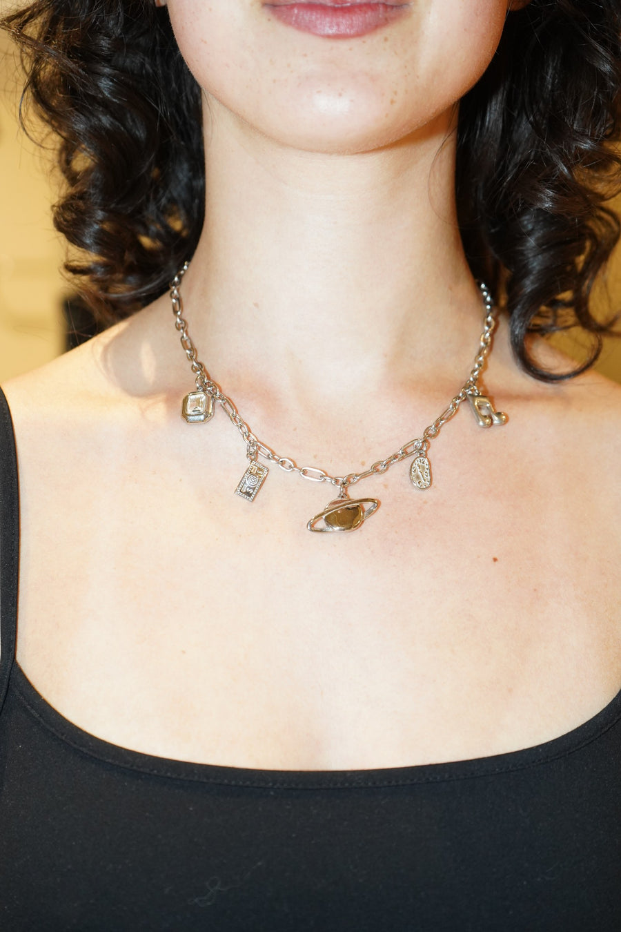 Custom charm necklace styled on a model